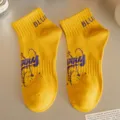 Yellow cotton short socks for men, featuring cute letter cuff and graffiti art print design. - Yellow