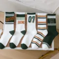Trendy men's mid-tube athletic socks with retro letter prints and striped cotton designs. - One Size (Sizes 36-44) Individual Packaging / 5 Colors Mixed