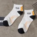 Calzini corti in cotone da uomo bianchi con tacco nero e strisce arancioni calze sportive casual - Taglia unica / Bianco