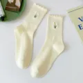 Women ruffled mid-calf socks with cute tulip embroidery, light yellow cotton casual crew socks. - One Size (EU 36-42) / Yellow (Embroidered)