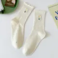 Women off-white mid-tube socks featuring cute ruffled cuffs and yellow tulip embroidery. - One Size (EU 36-42) / Off-White (Embroidered)