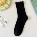 Women black ruffle mid tube socks cotton spring summer cute frilly stack hosiery apparel items. - One Size (EU 36-42) / Black (Solid Color)