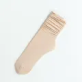 Comfortable women's solid color ribbed slouch socks, soft velvet long stockings for daily wear. - One Size / Nude