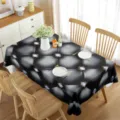 Mantel rectangular impermeable con patrón de rombos negros y decoración de mesa de comedor. - Estilo 6