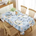 Detailed shot of a rectangular waterproof tablecloth with blue floral pattern for dining decor. - 70x40cm / Style 4