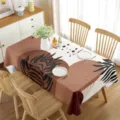 Detailed scene of modern boho abstract leaf tablecloth in cozy dining room setting. - Style 7