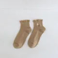 Japanese style women mid tube socks featuring cute floral embroidery and sweet lettuce trim khaki. - One Size / Khaki