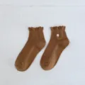 Cute Japanese style women autumn socks featuring floral embroidery and sweet ruffled cuffs. - One Size / Coffee