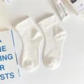 Classic white mid-calf socks for women, soft and breathable, perfect for daily wear. - One Size / Wide Ribbed Cuff