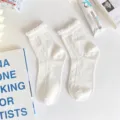White Japanese style cute JK mid-tube socks with lattice pattern and ruffle lace trim. - One Size / Argyle
