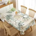 Detalle de mantel impermeable con hojas tropicales, ideal para decoración de comedor y verano. - 70x40cm / Estilo 4