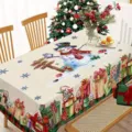 Vista detallada del mantel navideño impermeable con muñeco de nieve y regalo para decoración. - Estilo 5