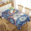 Vista dettagliata della tovaglia floreale colorata ambientata in una sala da pranzo. - 9