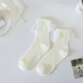Chaussettes mi-mollet Lolita en dentelle blanche JK jolies volants mode été fines - Taille unique / Dentelle à bords ondulés blanc cassé