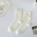 Chaussettes Lolita blanches avec noeud, chaussettes mi-hautes côtelées mignonnes mode. - Taille unique / Beige - Nœud Perle