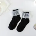 Chaussettes mi-hautes Lolita noires en dentelle volants douce mode JK pour femmes et filles. - Taille unique / Dentelle à motif étoile de mer noire