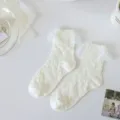 Chaussettes mi-hautes Lolita en dentelle blanche pour femme, jolies volants style rétro été. - Taille unique / Dentelle à motif étoile de mer blanc cassé