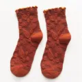 Women ethnic jacquard mid-tube socks with cute lettuce edge in retro rust red style. - One Size / Orange Red