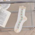 Sheer crystal silk socks with ruffles, sweet heart patterns, and mid-calf summer wear style. - One Size / Vertical Heart