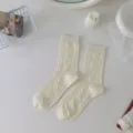 Chic women cotton mid tube socks with elegant diamond knit pattern, soft breathable spring wear. - One Size / Off White