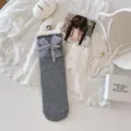 Grey mid-calf socks for women featuring sweet purple lace bows and ribbed knit. Cute daily wear. - One Size / Vertical Striped Gray