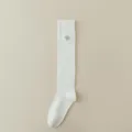White knee high ribbed socks for women featuring elegant silver bee embroidery classic style - One Size / White