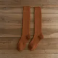Brown long thermal knit socks, cozy winter knee-high ribbed hosiery for daily wear. - One Size / Caramel color