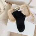 Chaussettes mi-hautes noires Lolita japonaises mignonnes avec bordure en dentelle blanche. - Taille unique / Noir