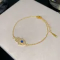 Elegante bracciale Mano di Fatima dorato con occhio del diavolo e pavé di zirconi - Stile Malocchio Blu 3 (Stile 3)