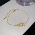 Elegant gold-plated stainless steel bracelet with sparkling skull charm and adjustable chain. - Gold Full Rhinestone Skull Style (款式10)