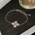 Exquisite silver-toned titanium steel cross bracelet with sparkling pave crystals - Silver Hollow Crown Full Rhinestone Cross Style (款式15)