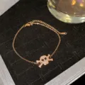 Elegant rose gold skull bracelet with sparkling crystal accents on a jewelry tray - Rose Gold Full Rhinestone Skull Style (款式19)