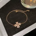 Elegant rose gold cross bracelet featuring fleur-de-lis and sparkling pave stones - Rose Gold Fleur-de-Lis Rhinestone Cross Style (Style 21)