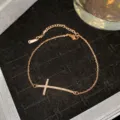 Rose gold titanium steel bracelet featuring a delicate cross pendant with starry rhinestones - Rose Gold Curved Rhinestone Cross Style (Style 27)