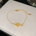 Bracelet main de Fatma doré avec œil protecteur en zircons et acier titane. - Style Œil Noir 8 (Style 8)