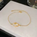 Bracelet main de Fatma en acier titane doré orné de zircons scintillants pour femme - Style de main dorée avec diamant rond (Style 11)