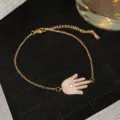 Bracelet main de Fatma élégant en or rose avec pavé de zircons étincelants pour femme chic - Style Hamsa Plein Pavé Doré (Style 27)