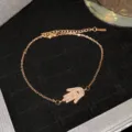 Bracelet Hamsa en acier titane or rose avec pavé de zircons cubiques étincelants - Style Hamsa Œil Noir Or Rose (Style 31)