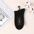 Klassische schwarze Rippenstrümpfe für Herren mit praktische Aufhänger und Etikett weiche Baumwolle. - Einheitsgröße / Schwarz