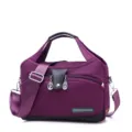 Stylish purple nylon women's shoulder handbag with top handles and cross-body strap. - Purple
