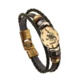 Detalle de pulsera de cuero trenzado con diseño de signo zodiacal Escorpio vintage. - Escorpio