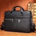 Sac d'affaires en cuir noir pour ordinateur portable avec bandoulière et poches. - Noir