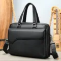 Borsa da lavoro nera in vera pelle per uomo, elegante borsa porta pc con tracolla regolabile. - Nero