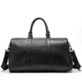 Sac de voyage noir en cuir souple avec bandoulière et compartiment à chaussures. - Noir (Longueur 44 cm)