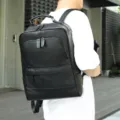 Black genuine leather backpack for men, stylish business travel casual laptop rucksack. - Black Embossed