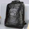 Men's black genuine leather backpack, stylish business casual laptop travel bag for daily use. - Black
