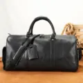 Sac de voyage noir en cuir véritable pour hommes, grand sac de sport avec compartiment. - Cuir à tannage végétal noir