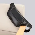 Black leather chest bag, casual sports waist bag with zipper and adjustable strap. - Black