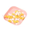 Pink square plastic plate with yellow candies, Nordic style snack tray for home party use. - 15.3x15.3x2.3cm / Pink