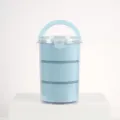 Portable 3-tier plastic lunch box in light blue with handle, compact sealed food container. - Nordic Blue
